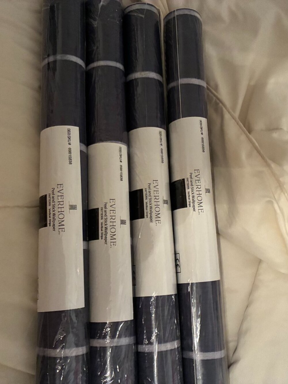 Everhome Peel and stick Wallpaper each roll has 18" X 18.86'